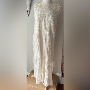 Anthropologie dress by Tiny. Beautiful embroidered off white shift dress.
